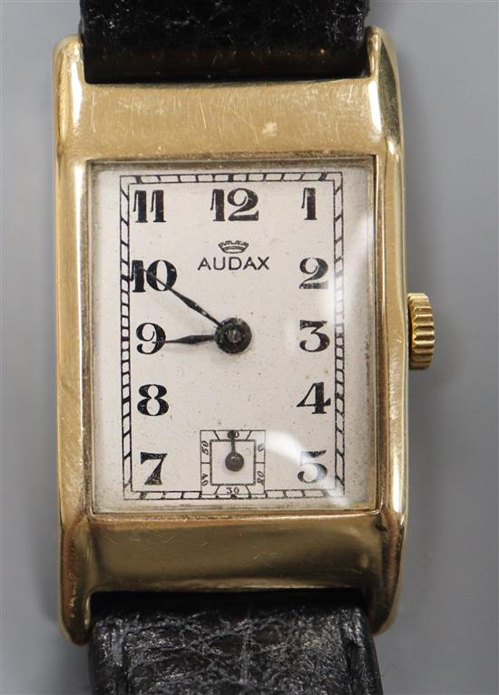 A gentlemans early 1940s 9ct gold Audax manual wind wrist watch, with rectangular Arabic dial and subsidiary seconds,